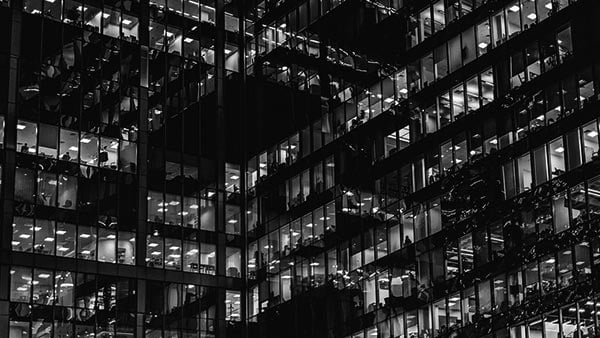 Office building at night with windows